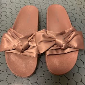 Pink satin Steve Madden slides.